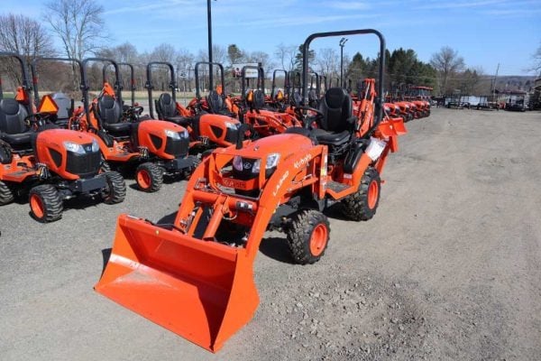 Kubota compact tractors that are outside